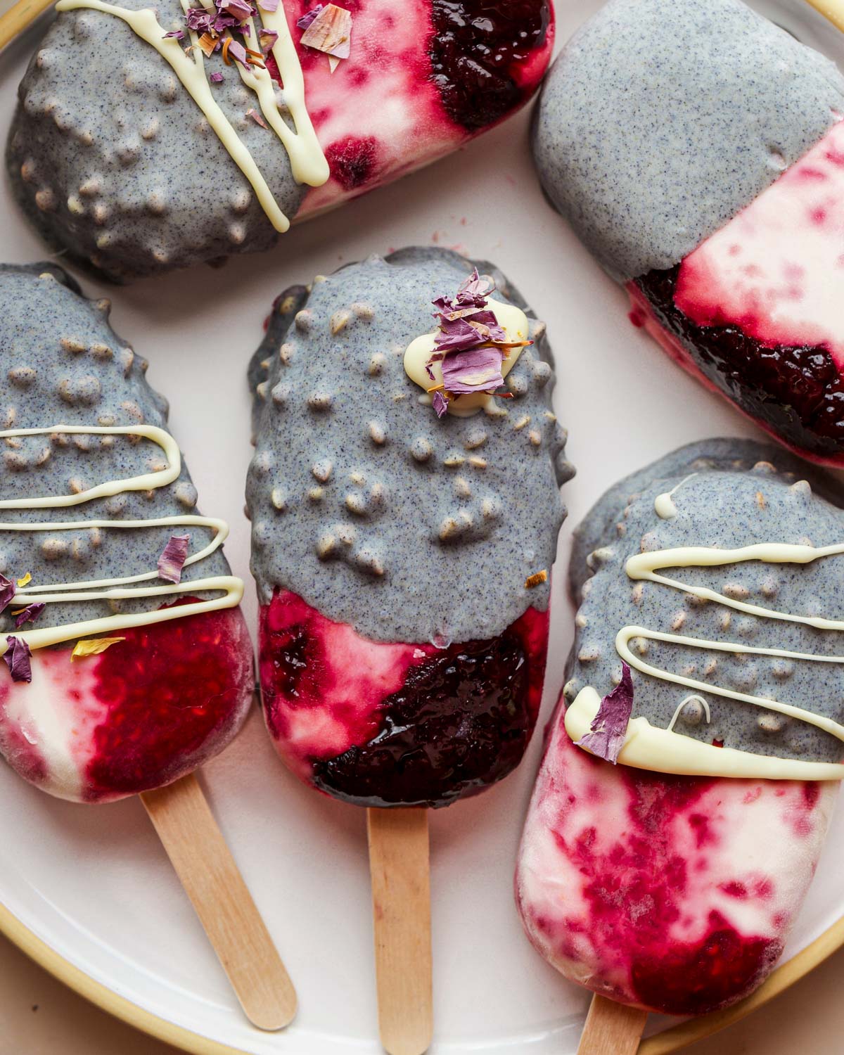 Raspberry Frozen Yogurt Popsicles with Butterfly Pea White Chocolate