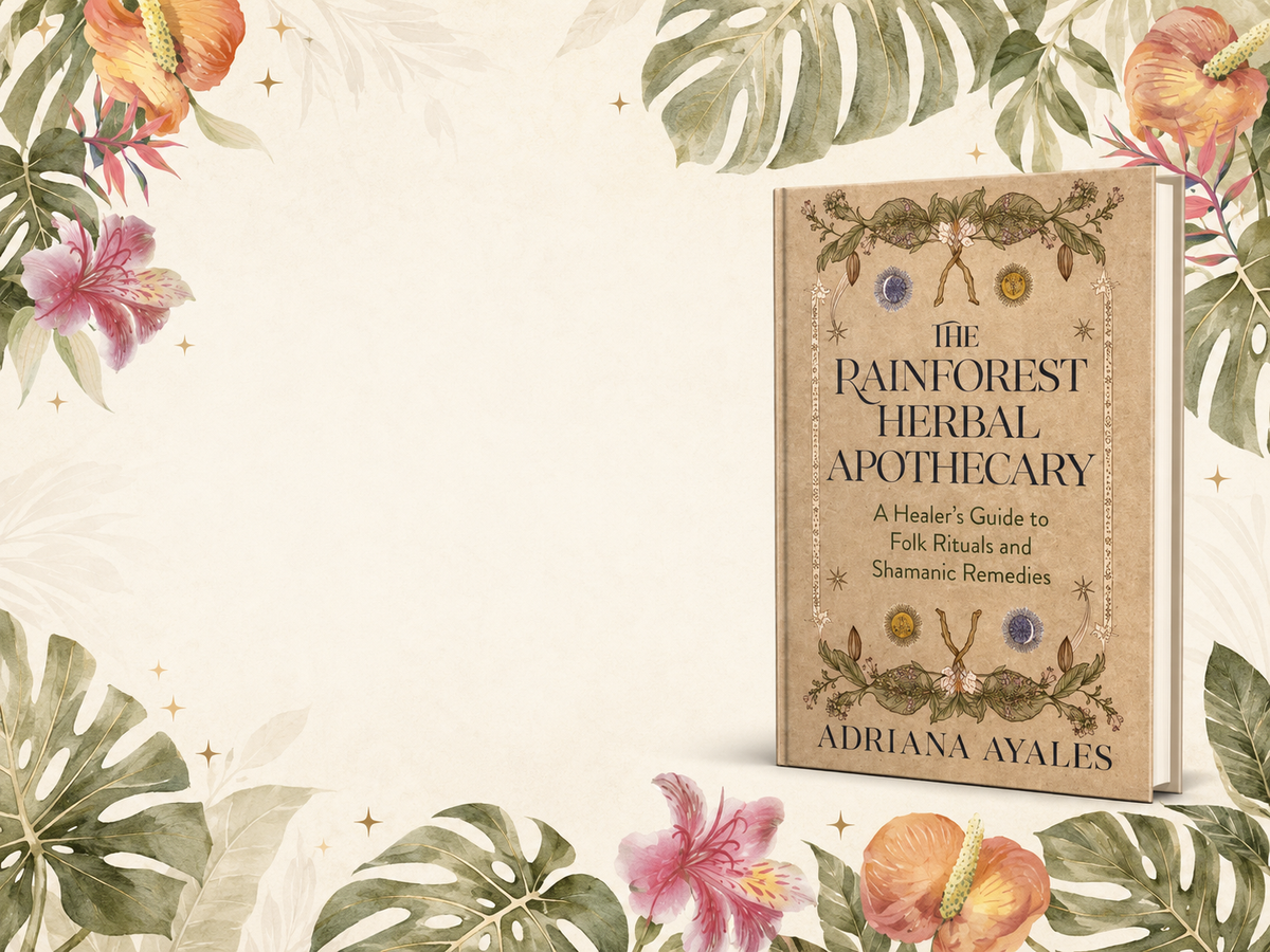 The Rainforest Herbal Apothecary book by Adriana Ayales, shown standing upright on a cream background with tropical leaves and flowers around the edges.